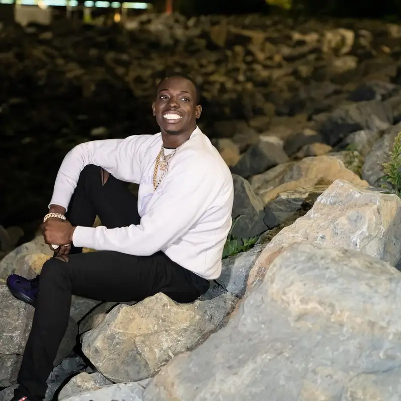 Bobby Shmurda outfit in Saint Laurent, Amiri, and Prada, 2022