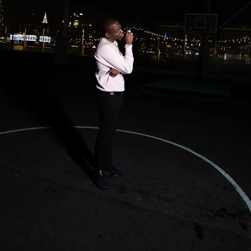 Bobby Shmurda outfit in Saint Laurent, Amiri, and Prada, 2022