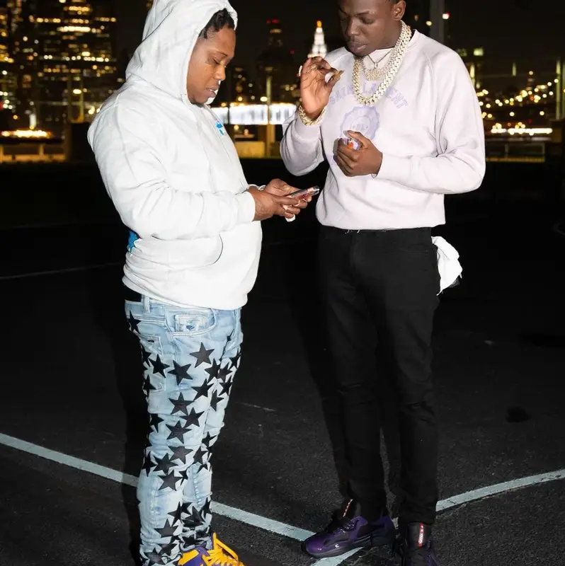 Bobby Shmurda outfit in Saint Laurent, Amiri, and Prada, 2022