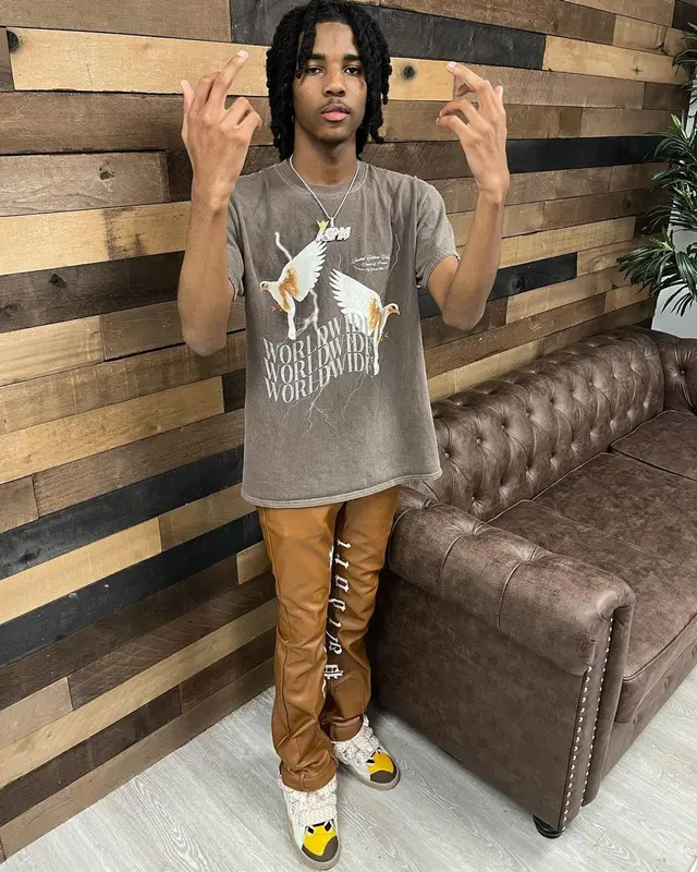 Lil Darius outfit in BooHooMan, Palidori, and Lanvin, 2022