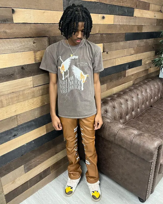 Lil Darius outfit in BooHooMan, Palidori, and Lanvin, 2022