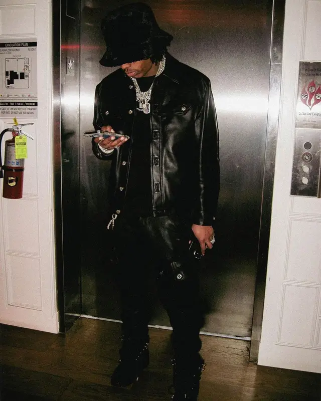 Lil Baby outfit in Chrome Hearts, Maison Margiela, and Mnml, 2022