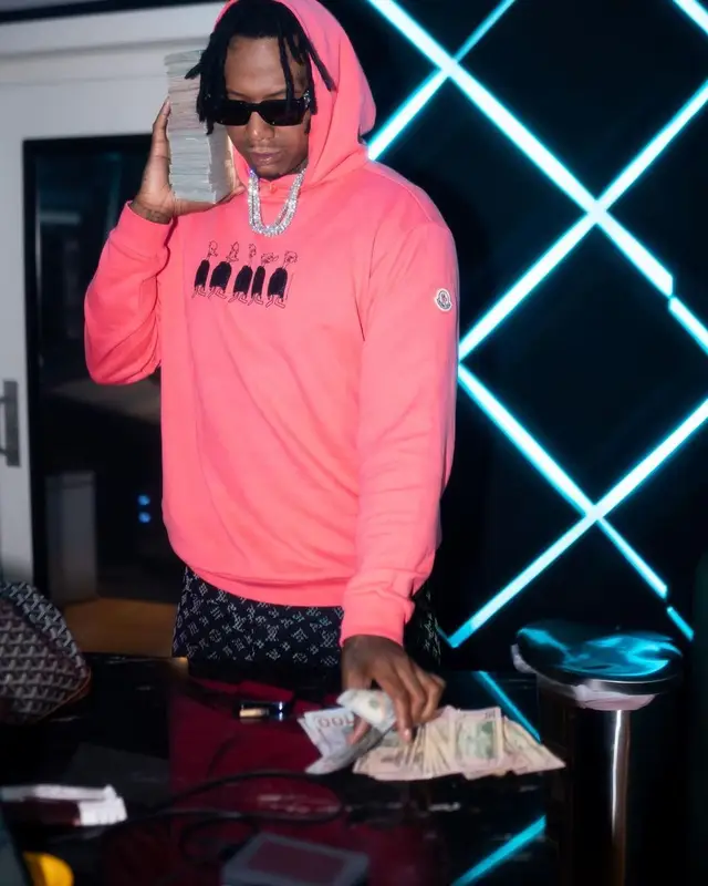 Moneybagg Yo outfit in Moncler, Louis Vuitton, and Cactus Jack, 2022