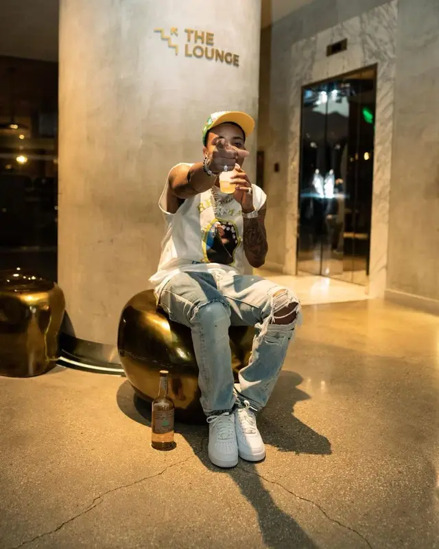G Herbo outfit in Readymade, Gallery Dept., and Denim Tears, 2022