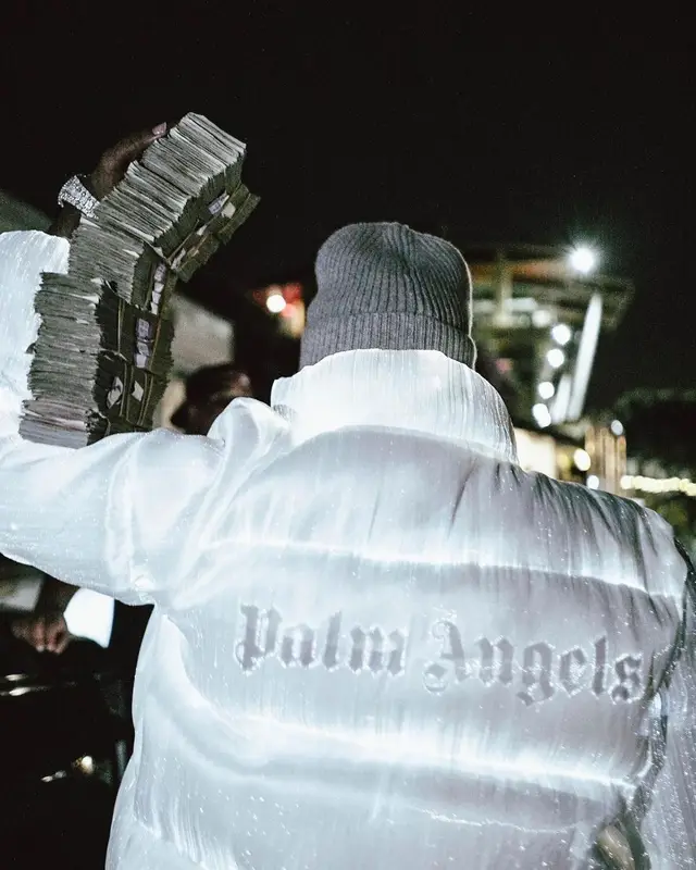 Finesse2tymes outfit in Moncler, Amiri, and Palm Angels, 2022