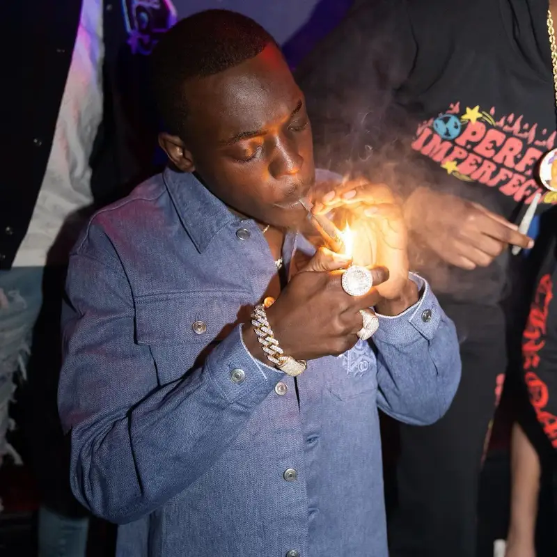 Bobby Shmurda outfit in Dior, Amiri, and Gucci, 2022