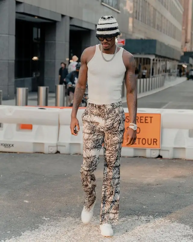 Jarred Vanderbilt outfit in Amiri, Louis Vuitton, and Suss, 2022