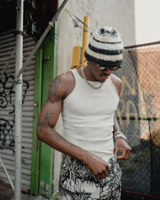 Jarred Vanderbilt outfit in Amiri, Louis Vuitton, and Suss, 2022