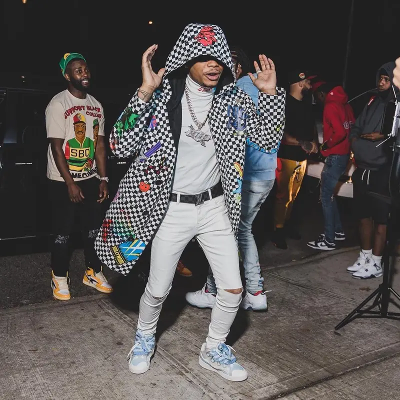 Lil Migo outfit in Amiri, Lanvin, and Louis Vuitton, 2022