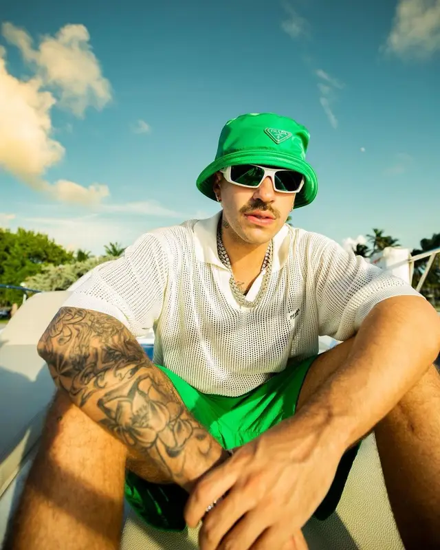 Feid outfit in Oakley, Prada, and Nike, 2022