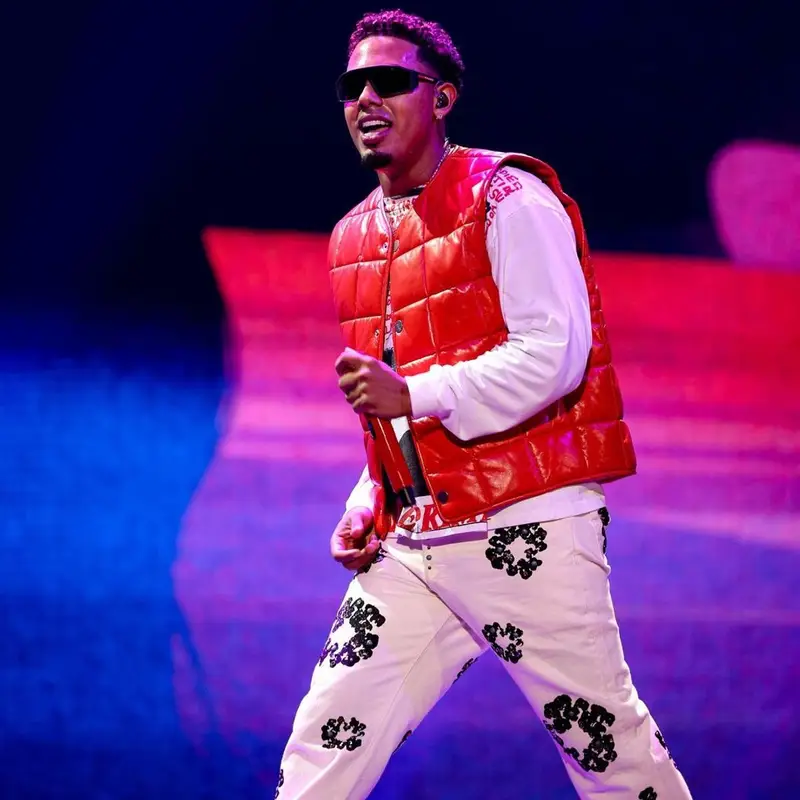 Myke Towers outfit in Bottega Veneta, Denim Tears, and Prada, 2022