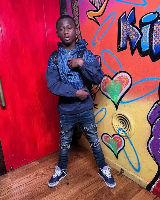 Bouba Savage outfit in Dior, Amiri, and Jordan, 2022