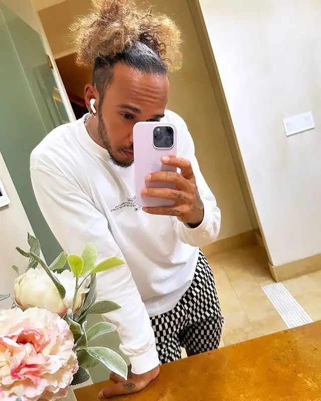 Lewis Hamilton outfit in Takashi Murakami, Apple, and Nanushka, 2022