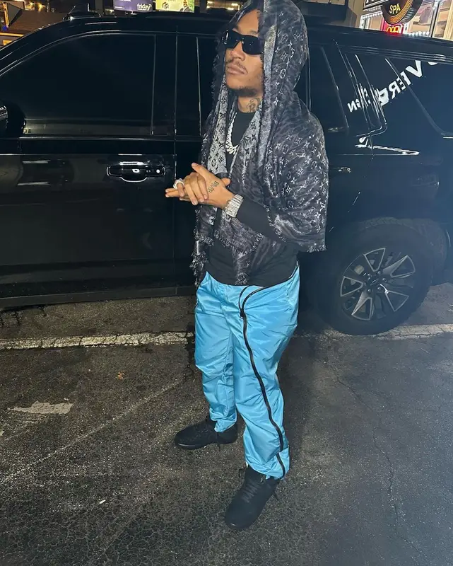 Lil Meech outfit in Bottega Veneta, Balenciaga, and Louis Vuitton, 2022
