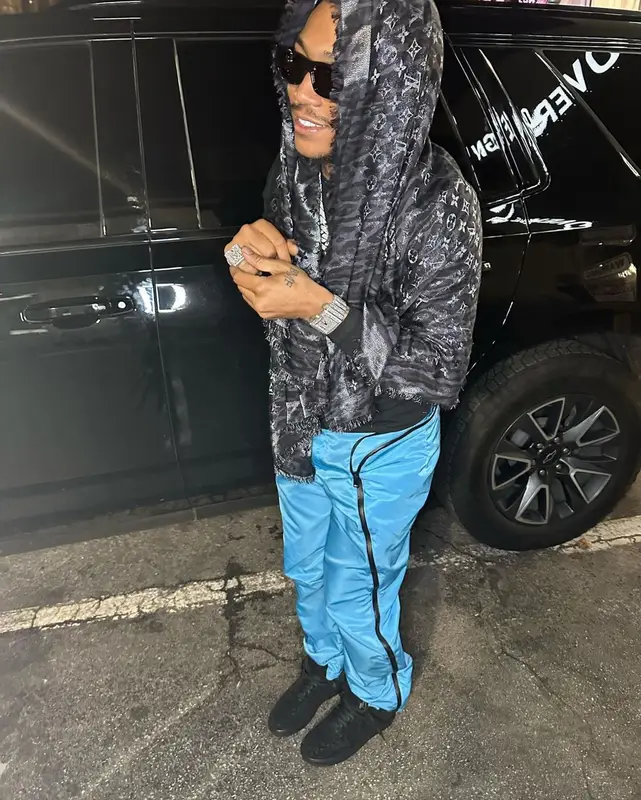 Lil Meech outfit in Bottega Veneta, Balenciaga, and Louis Vuitton, 2022