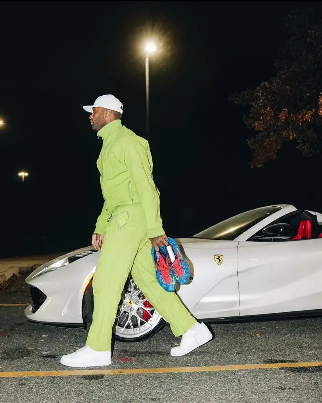 PJ Tucker outfit in Bottega Veneta, Louis Vuitton, and Nike, 2022