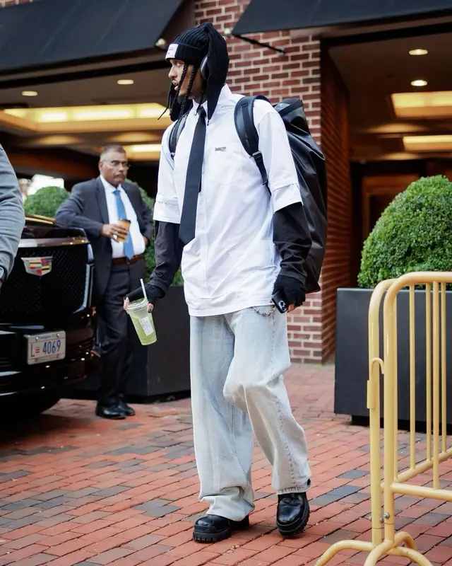 Jordan Clarkson outfit in Balenciaga, Loverboy by Charles Jeffrey, and Apple, 2022