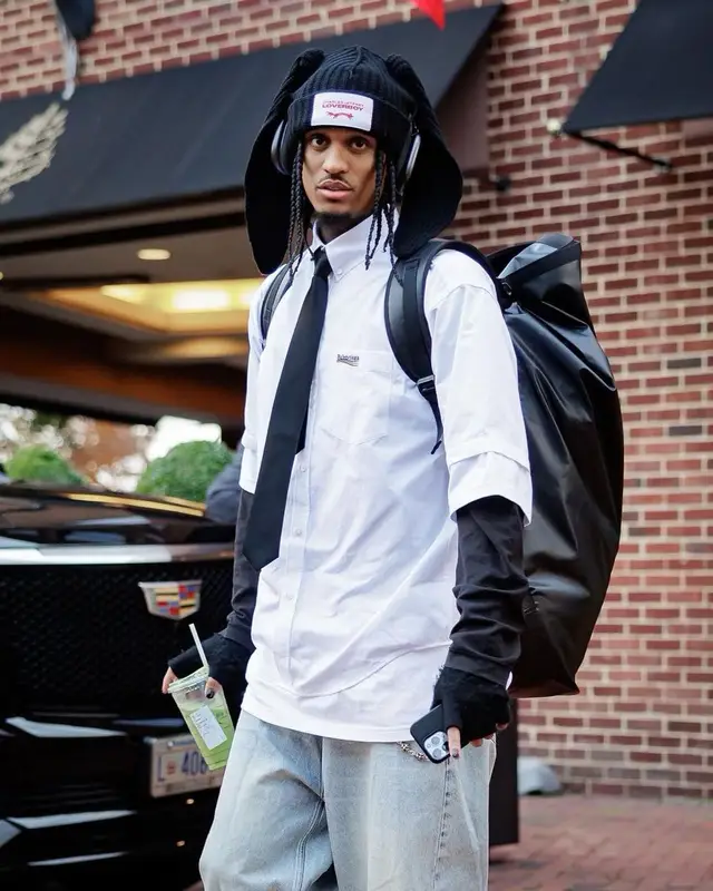 Jordan Clarkson outfit in Balenciaga, Loverboy by Charles Jeffrey, and Apple, 2022