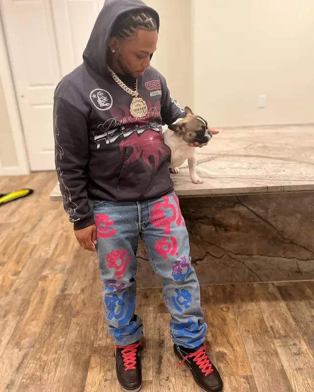 Don Q outfit in Denim Tears, Jordan, and Bstroy, 2022