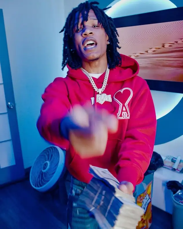 B Lovee outfit in Ami, Amiri, and Nike, 2022