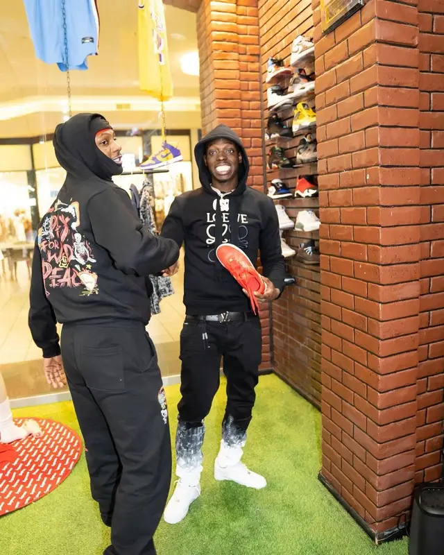 Bobby Shmurda outfit in Loewe, Nike, and Louis Vuitton, 2022