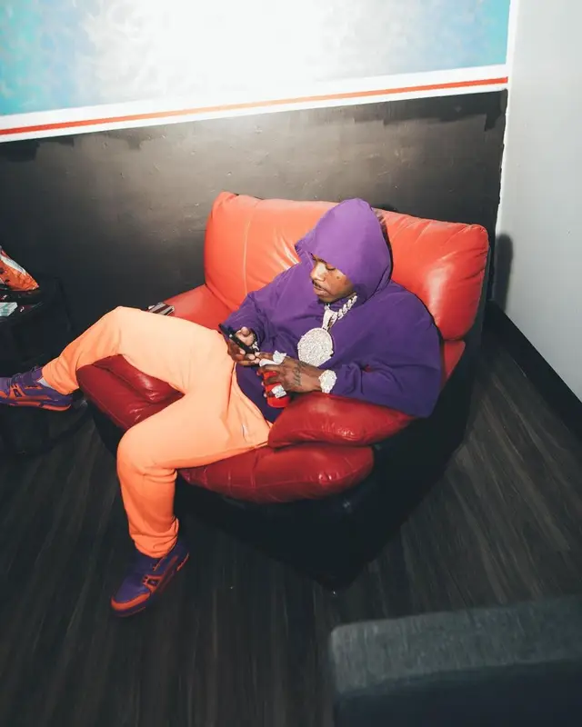 DaBaby outfit in Louis Vuitton and Balenciaga, 2022