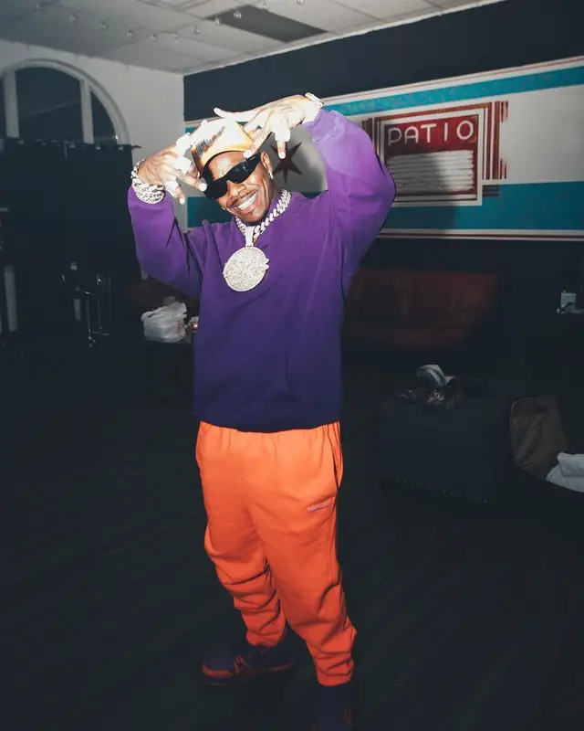 DaBaby outfit in Louis Vuitton and Balenciaga, 2022