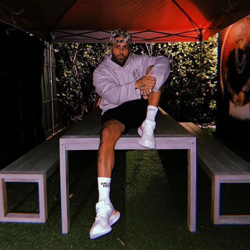 Nicky Jam outfit in Honor The Gift, Nike, and Gallery Dept., 2022
