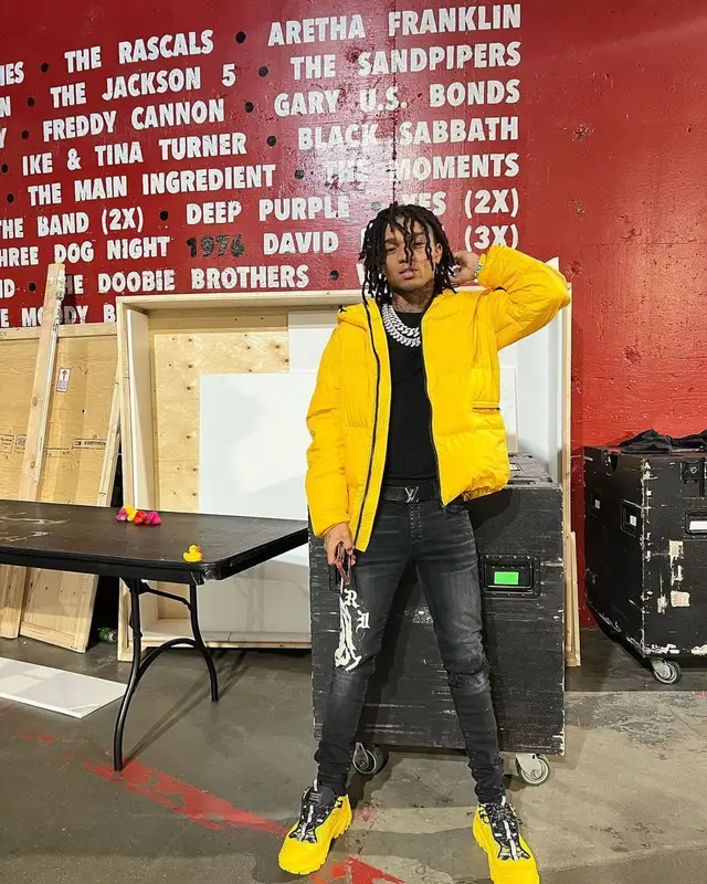 Swae Lee outfit in Stone Island, Amiri, and Louis Vuitton, 2022