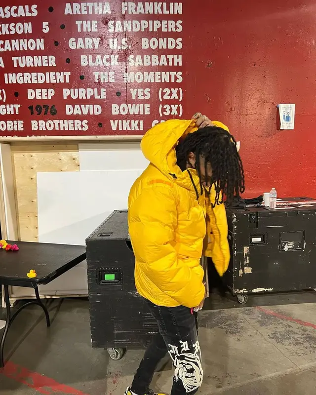 Swae Lee outfit in Stone Island, Amiri, and Louis Vuitton, 2022