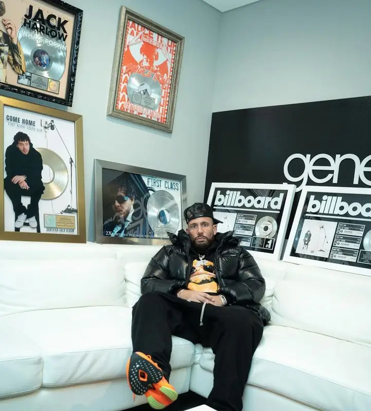 DJ Drama outfit in Purple Brand, Vlone, and Amiri, 2022