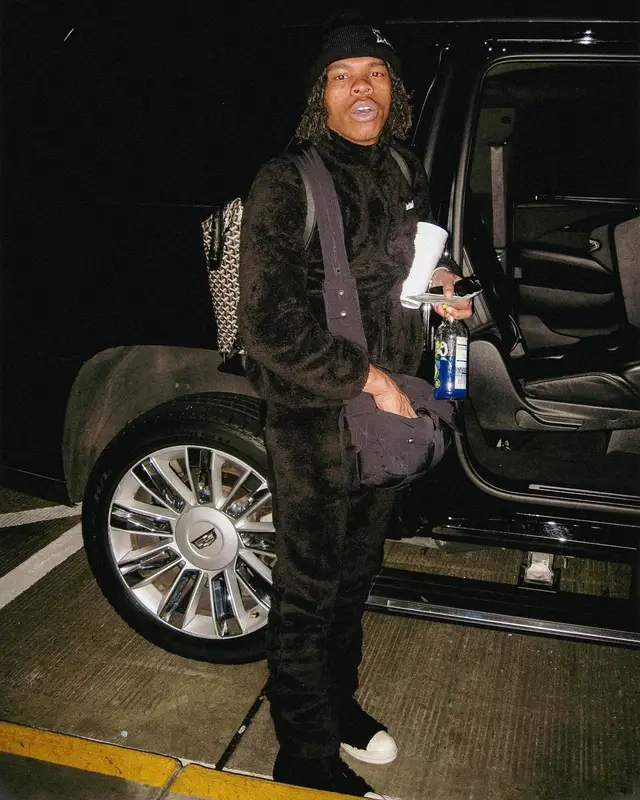 Lil Baby outfit in Sinclair, Bottega Veneta, and Goyard, 2022