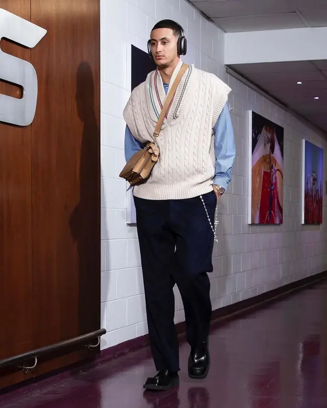 Kyle Kuzma outfit in Maison Margiela, Fendi, and Apple, 2022