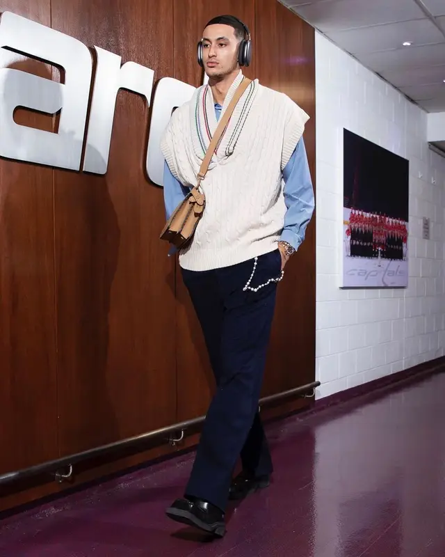 Kyle Kuzma outfit in Maison Margiela, Fendi, and Apple, 2022