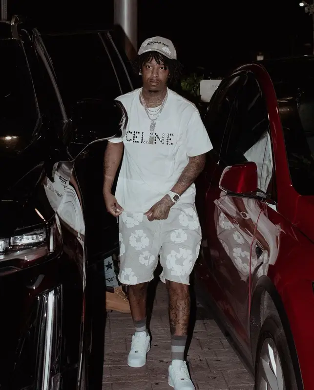 21 Savage outfit in Celine, Readymade, and Denim Tears, 2022