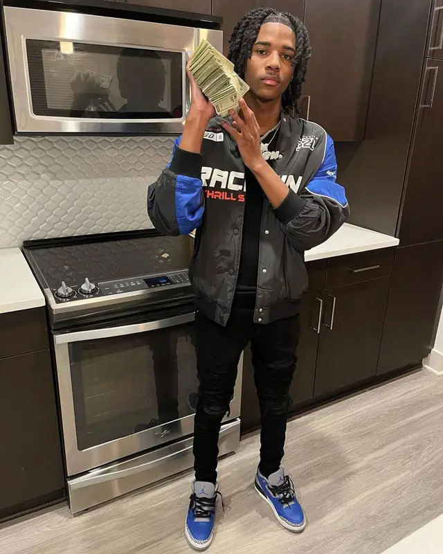 Lil Darius outfit in H&M, Amiri, and Jordan, 2022