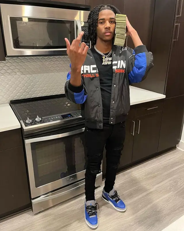 Lil Darius outfit in H&M, Amiri, and Jordan, 2022