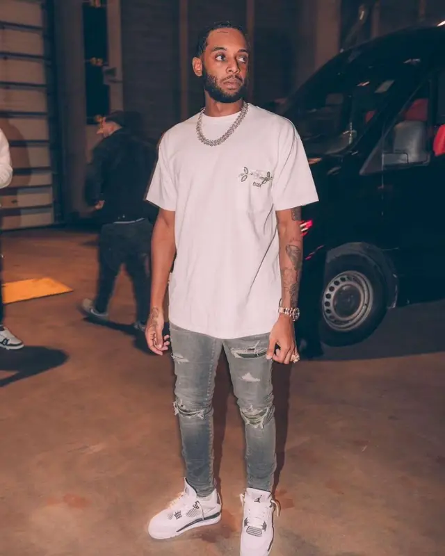 Dirtbike LB outfit in Bode, Amiri, and Louis Vuitton, 2022