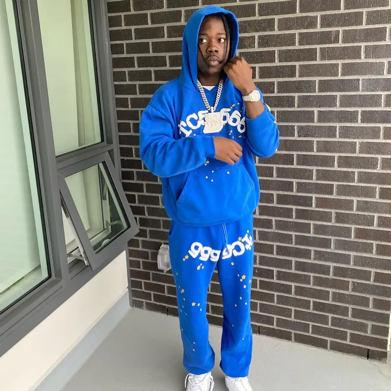 Burna Bandz outfit in Spider Worldwide and Nike, 2022