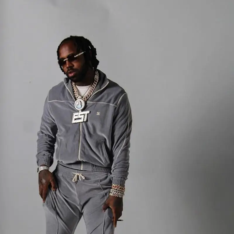 EST Gee outfit in Celine, Dior, and Cartier, 2022