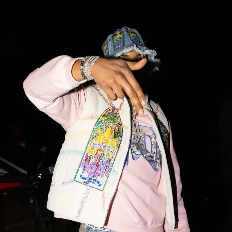 G Herbo outfit in Nike and Who Decides War, 2022