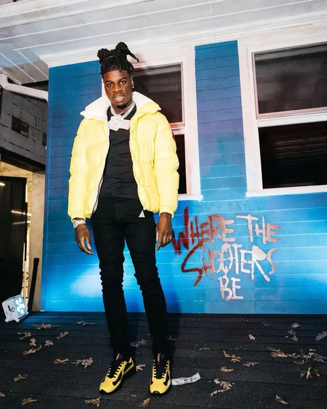SleazyWorld Go outfit in Moncler, Amiri, and Prada, 2022