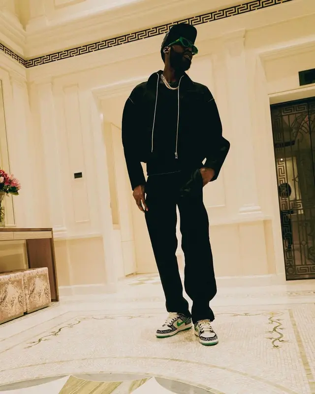 Meek Mill outfit in Prada, Bottega Veneta, and Louis Vuitton, 2022