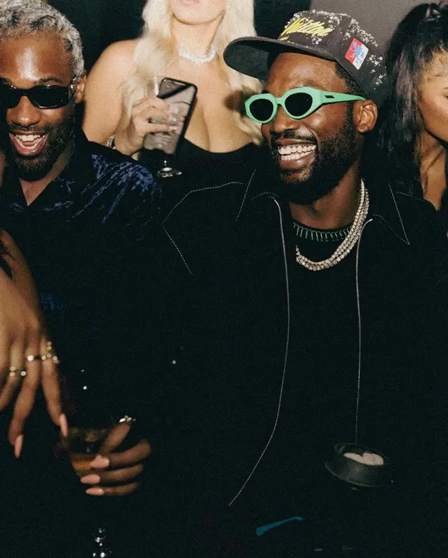 Meek Mill outfit in Prada, Bottega Veneta, and Louis Vuitton, 2022
