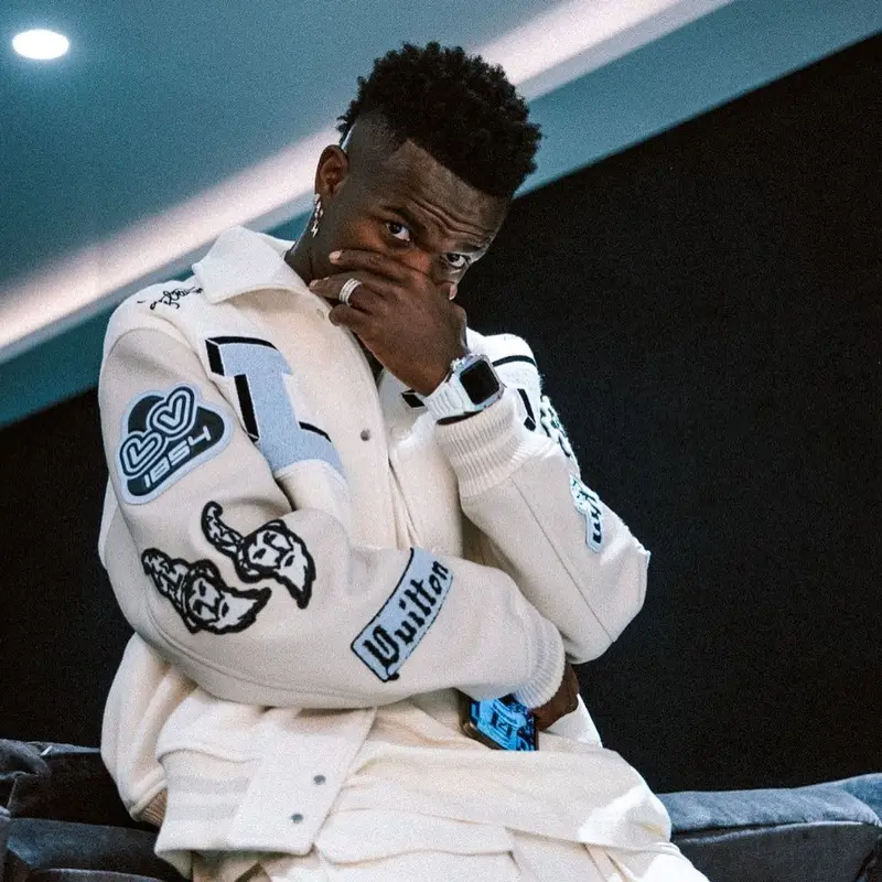 Vinicius Jr outfit in Louis Vuitton, Balenciaga, and Nike, 2022