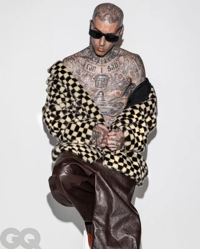 Travis Barker outfit in Amiri, Givenchy, and Thierry Lasry, 2022