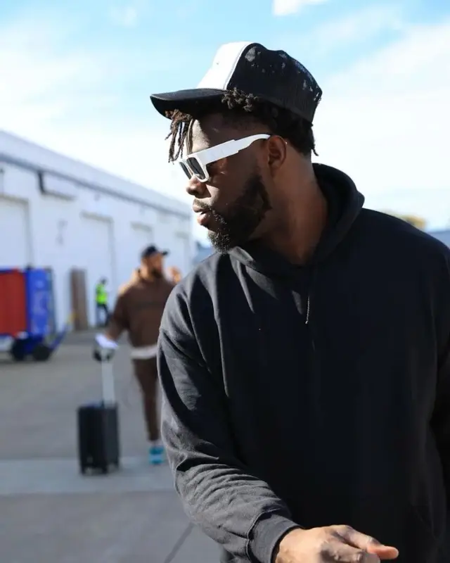 Shaq Lawson outfit in Nike, Louis Vuitton, and Dior, 2022