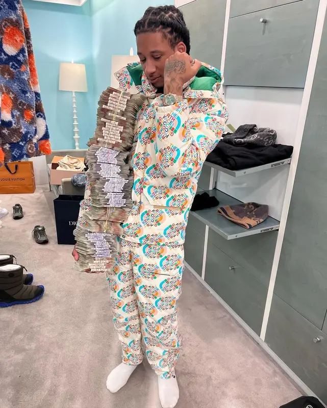 Digga D outfit in Gucci, Rolex, and The North Face, 2022