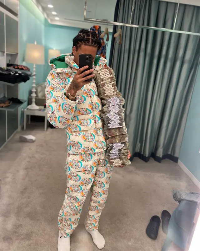 Digga D outfit in Gucci, Rolex, and The North Face, 2022