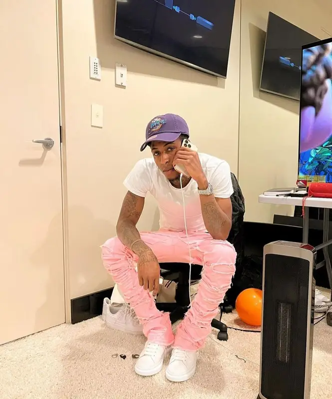 NBA YoungBoy outfit in Polo Ralph Lauren, Alexander McQueen, and Mitchell & Ness, 2022